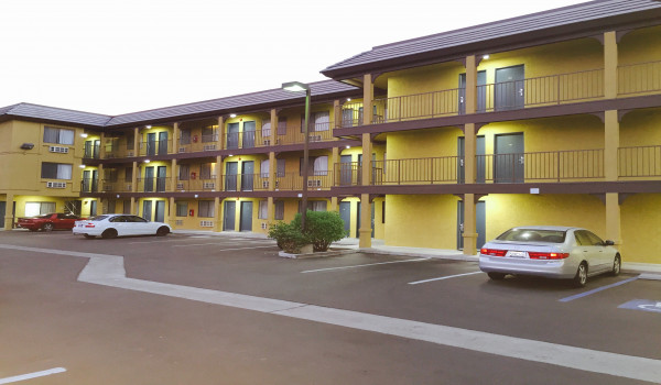 Simply Home Inn & Suites Riverside - Exterior at Night at the Simply Home Inn & Suites